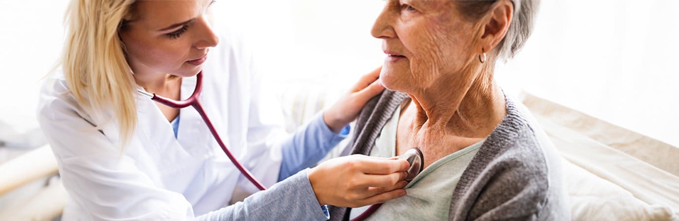 Female doctor talking to a female patient