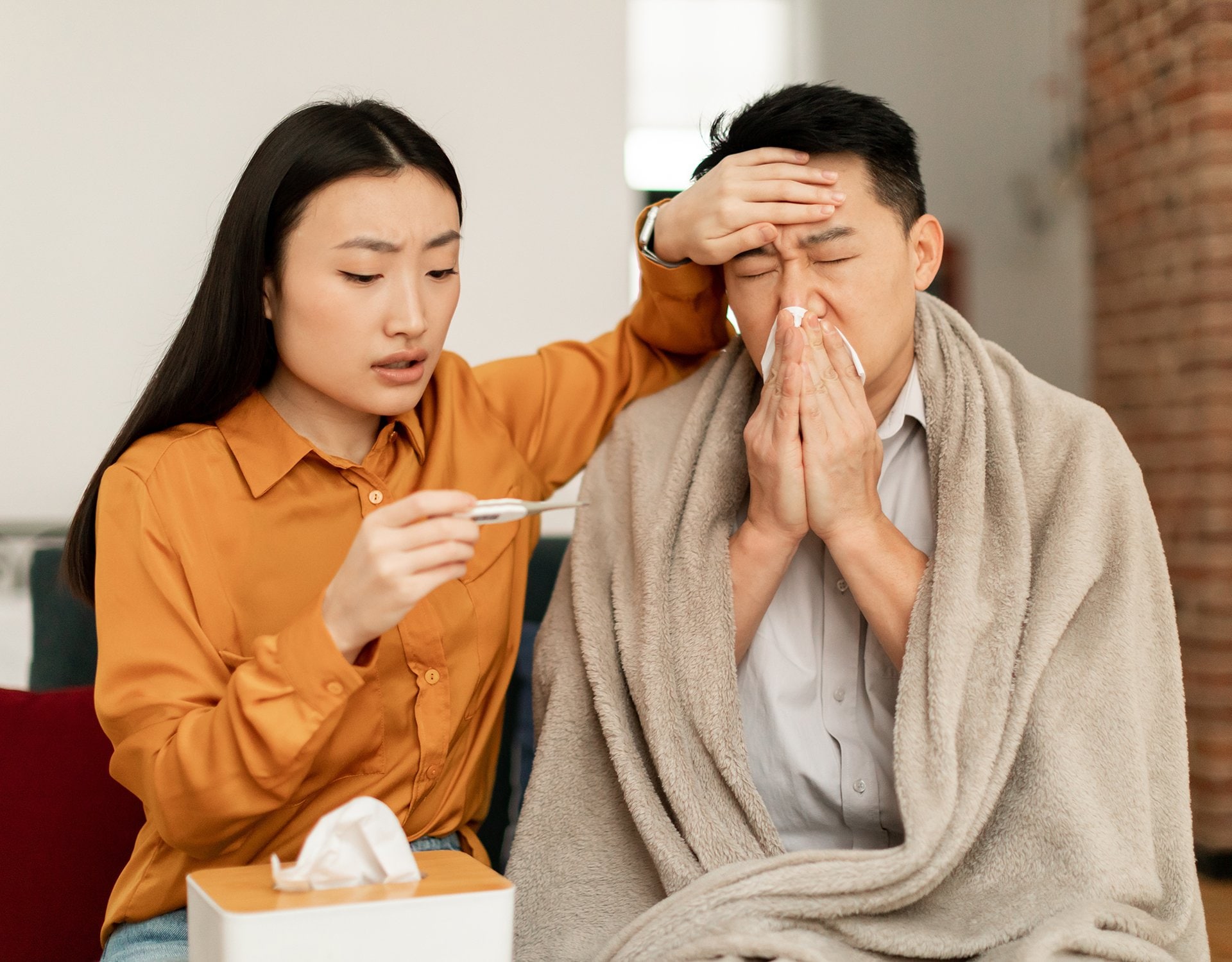 Asian woman and sick man