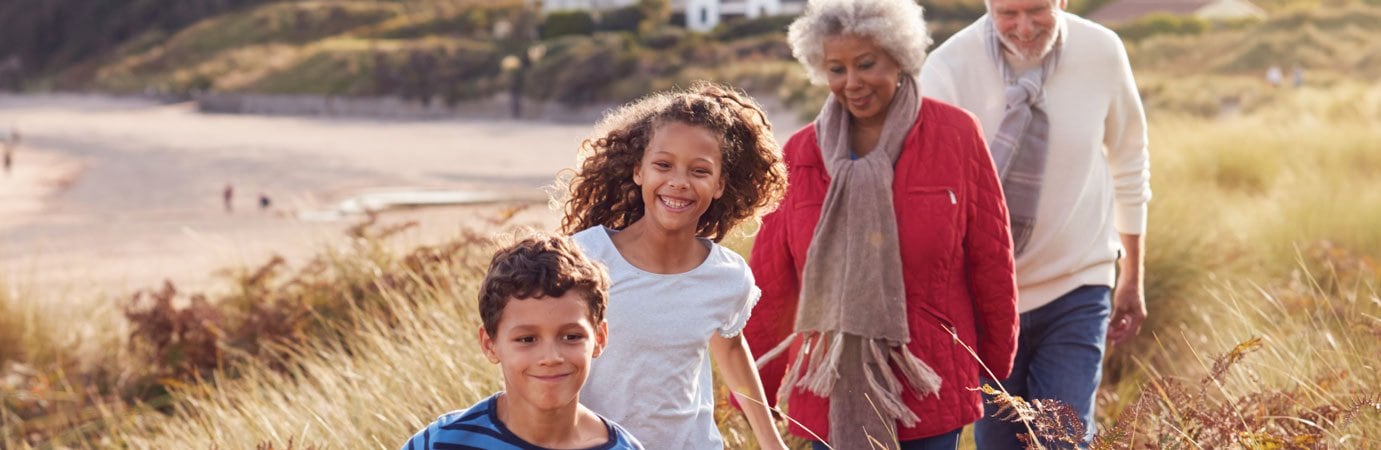 Family walking on the beach