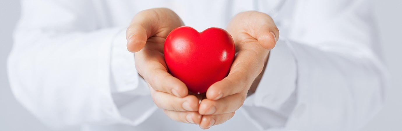 doctor holding a heart