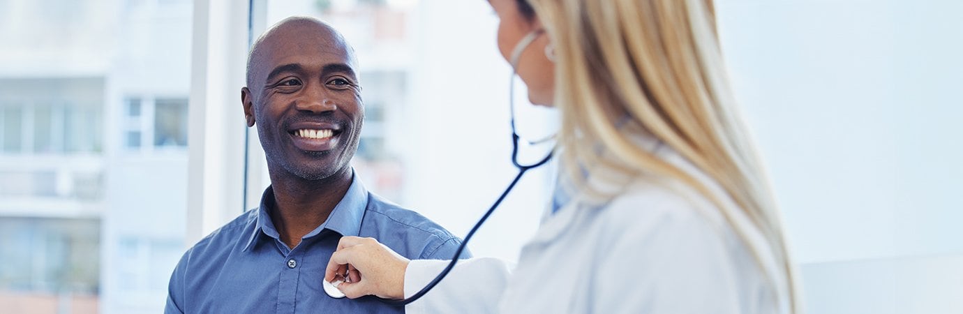 Man speaking with a doctor