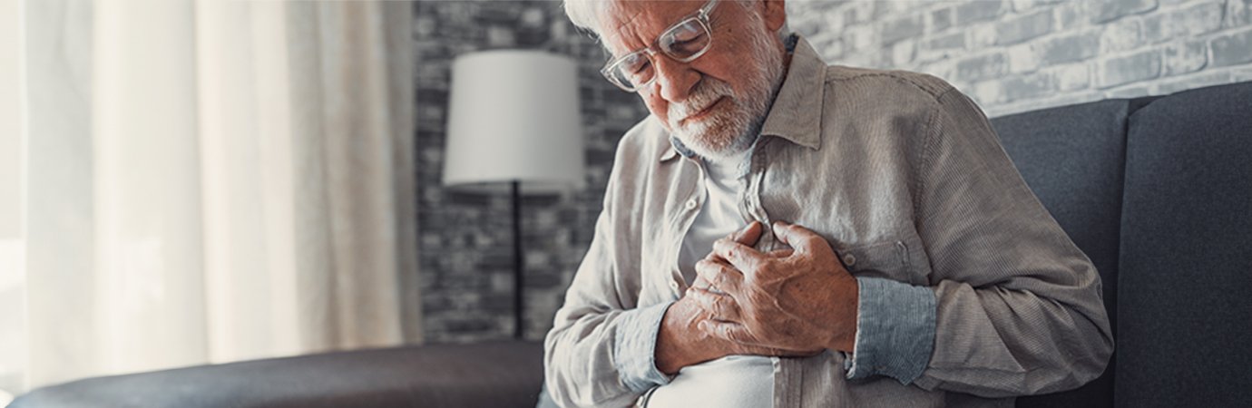 Man with his hand over his heart