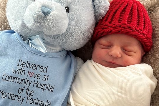 Baby and teddy bear