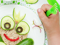 Child eating vegetables