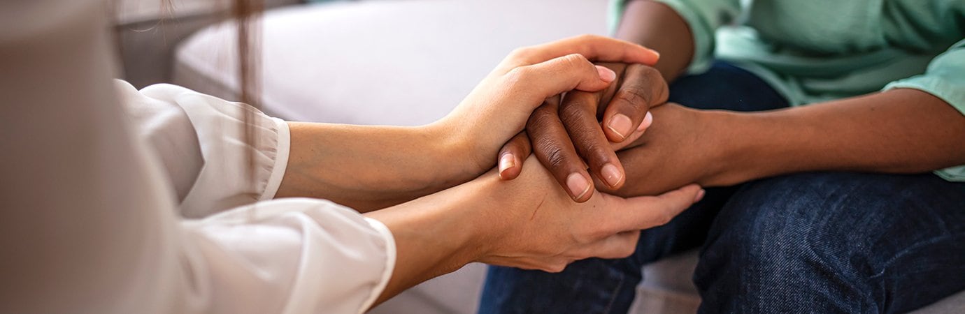 two people holding hands